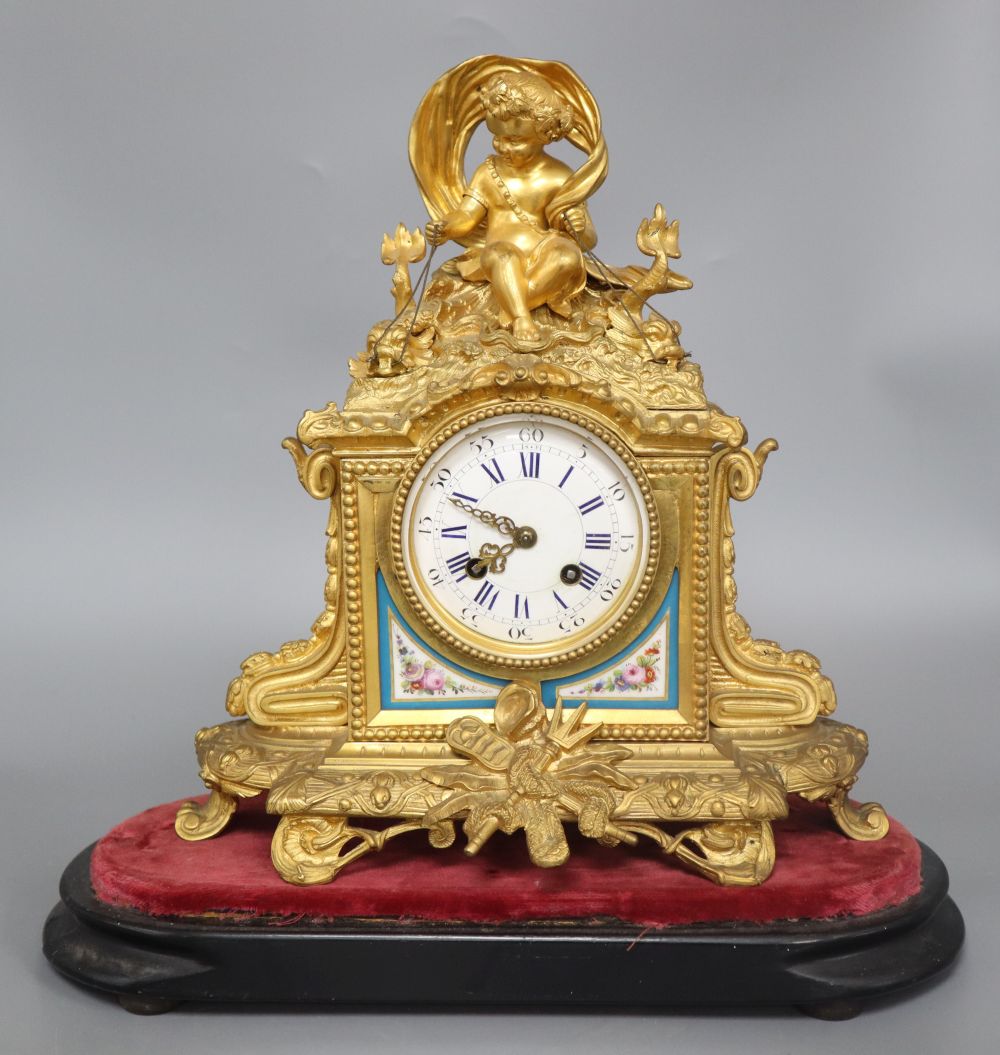 A late 19th century French gilt metal mounted eight day mantel clock (requiring restoration), height 39cm